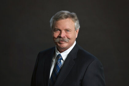 Portrait of Charlie Fischer, Alberta Order of Excellence member and former President and CEO of Nexen