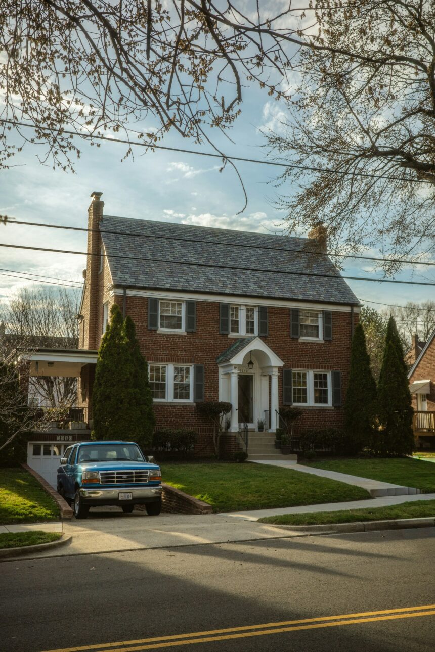 Moving truck outside a house