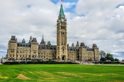 Parliament building in Ottawa under an overcast sky