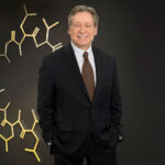 Portrait of pharmaceutical scientist Dr. Robert Foster, 2024 Alberta Order of Excellence inductee