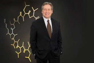 Portrait of pharmaceutical scientist Dr. Robert Foster, 2024 Alberta Order of Excellence inductee