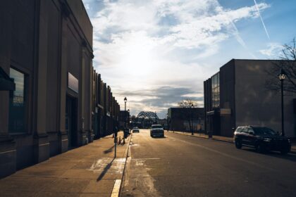 A small town main street lined with low storefronts