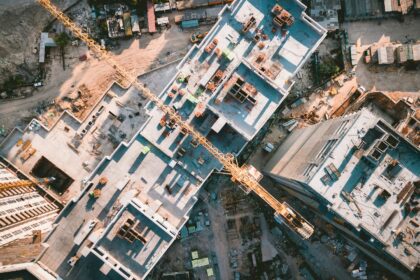 An aerial view of an apartment building under construction