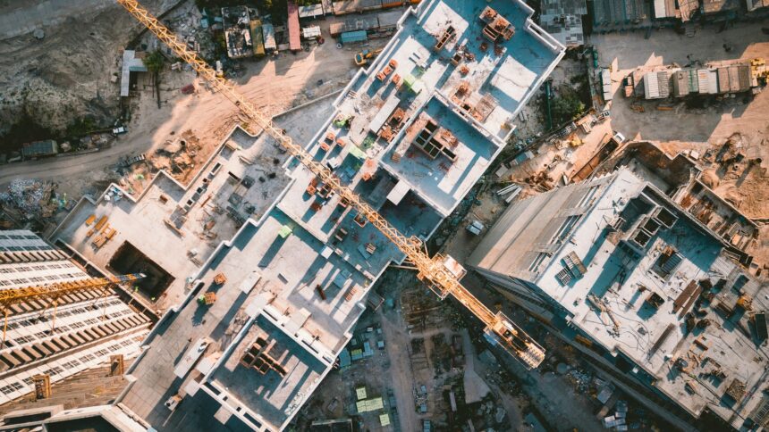 An aerial view of an apartment building under construction