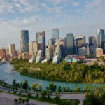 The Calgary skyline and residential towers beside the Bow River
