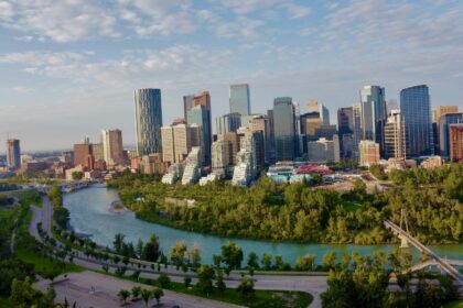 The Calgary skyline and residential towers beside the Bow River