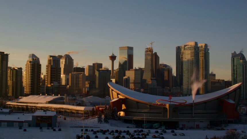 The Calgary skyline at dusk seen from Scotsman's Hill