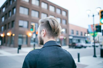A man walking along a downtown street in Red Deer, Alberta
