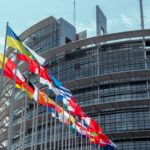Flags outside the European Parliament building in Strasbourg, France