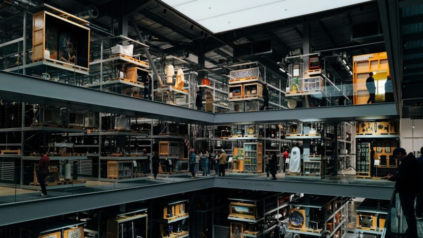 Rows of shelving holding boxed collection material in a storage vault