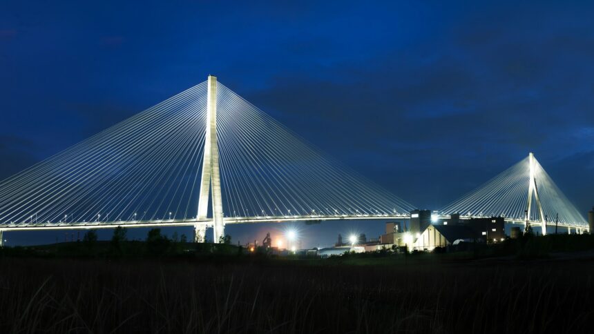 The Gordie Howe International Bridge lit up at night from the Windsor side