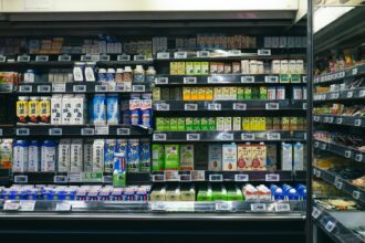 Grocery store shelves stocked with food and drinks