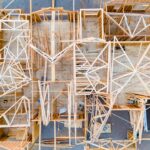 An overhead view of the wooden framing of a house under construction