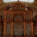 The carved case and pipe facade of a large concert organ