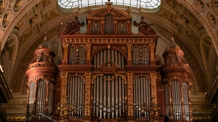 The carved case and pipe facade of a large concert organ