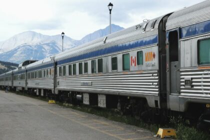 Stainless steel passenger rail cars at the station in Jasper, Alberta