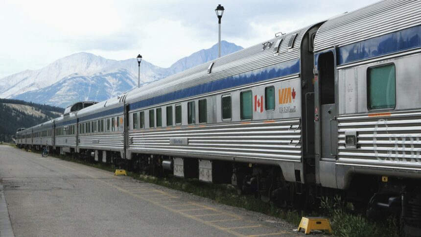 Stainless steel passenger rail cars at the station in Jasper, Alberta