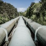 A crude oil pipeline running across open country