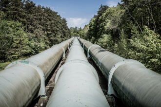 A crude oil pipeline running across open country