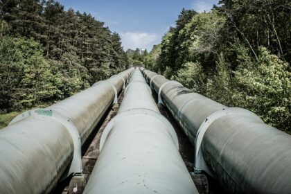 A crude oil pipeline running across open country