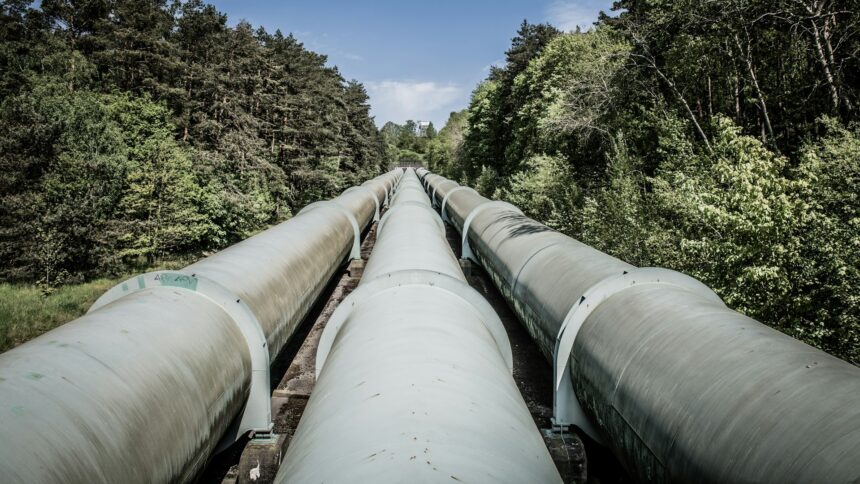 A crude oil pipeline running across open country