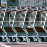 A row of nested shopping carts seen from above