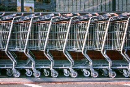 A row of nested shopping carts seen from above