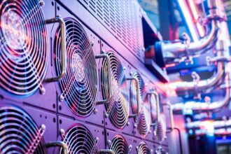 Close up of cooling fans on server equipment in a data centre