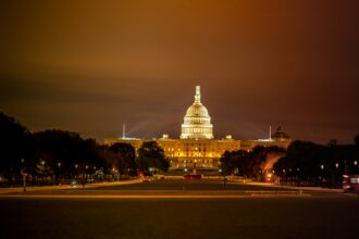 The United States Capitol building lit up at night
