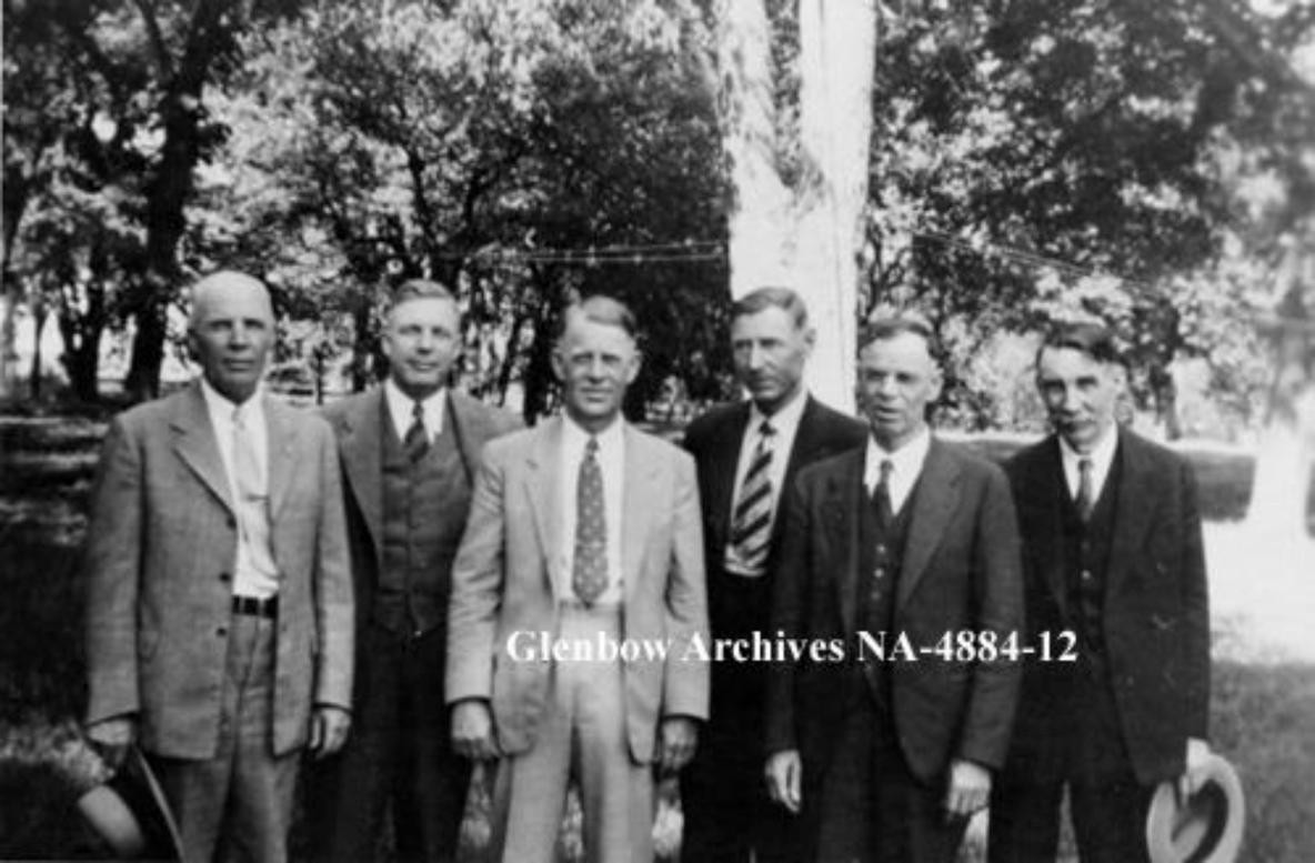 Charles S. Noble standing with his five brothers outdoors in Clemons, Iowa, in June 1936