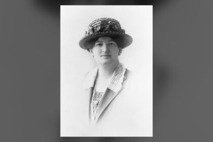 Black and white studio portrait of a woman in a brimmed hat, Nellie McClung