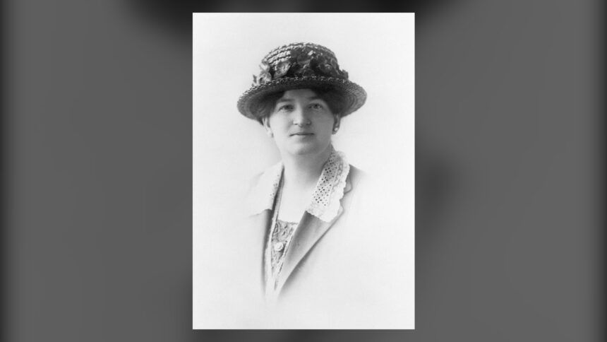 Black and white studio portrait of a woman in a brimmed hat, Nellie McClung